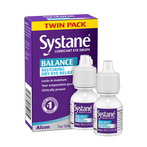 Image of Alcons Systane Balance 2-Pack Lubricant Eye Drops for MGD. The purple box highlights Balance Restoring Dry Eye Relief, with two white bottles emphasizing moisture lock and tear evaporation protection on the packaging.