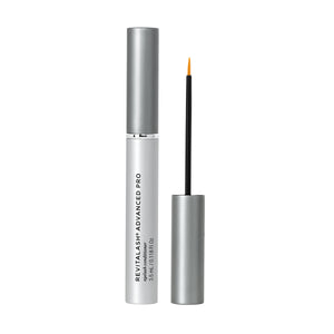 The RevitaLash Advanced PRO Eyelash Conditioner and Enhancing Serum (3.5mL, 6 Mo. Supply), shown here with its cap off, reveals a thin applicator brush. This sleek silver tube features black text and contains a formula designed to condition and strengthen brittle lashes.