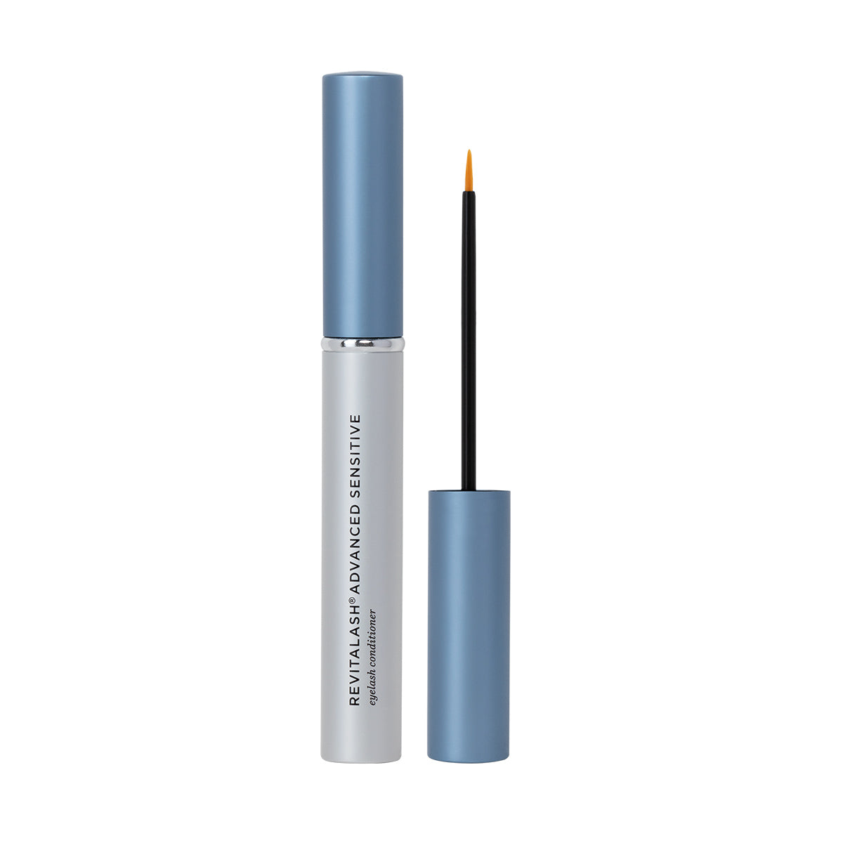 A tube of RevitaLash Advanced Eyelash Conditioner and Enhancing Serum Sensitive (2.0mL 3 Mo.Supply), featuring a silver design with a light blue cap, showcases the brand name and details on the front, enriched with peptides and botanicals for gentle care, complete with a brush applicator extended.