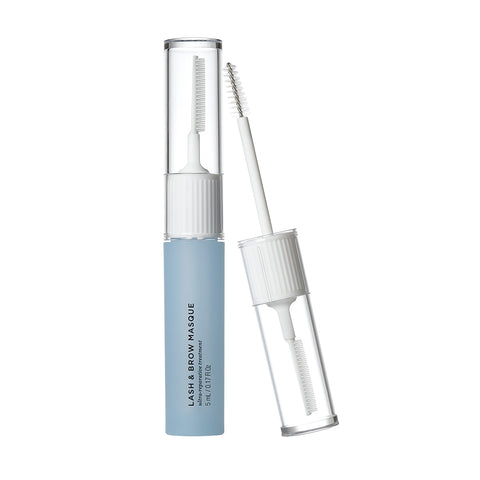 The RevitaLash Lash and Brow Masque comes in a sleek blue tube, featuring a clear cap. The white applicator wand with its fine brush is ready to apply nutrient-rich ingredients that rejuvenate compromised lashes and brows, all under minimalist branding.