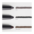 The RevitaLash Defining Liner Eyeliner features three stacked pencils: Slate (light gray), Black (deep black), and Dark Brown (rich brown). Each creamy liner offers smudge-proof wear with labels that match their color swatches precisely.