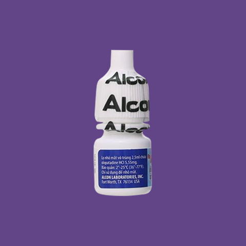 A small white and blue plastic eye drop bottle is set against a purple background. Pataday Once Daily Relief by Alcon is boldly printed on the cap in black, with packaging detailing its use as olopatadine hydrochloride, an antihistamine solution. Available in single and twin packs.